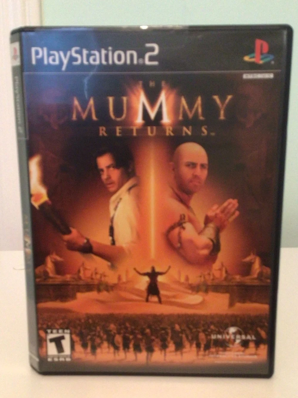 Sony PlayStation 2 The Mummy Returns (orange, black)